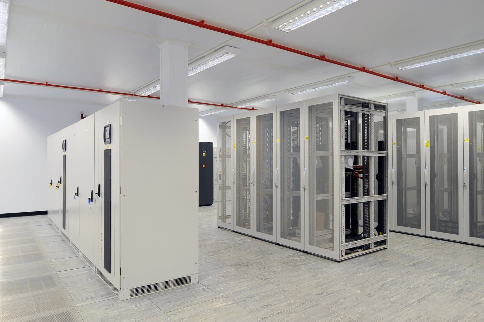 Rows of server cabinets in a data center