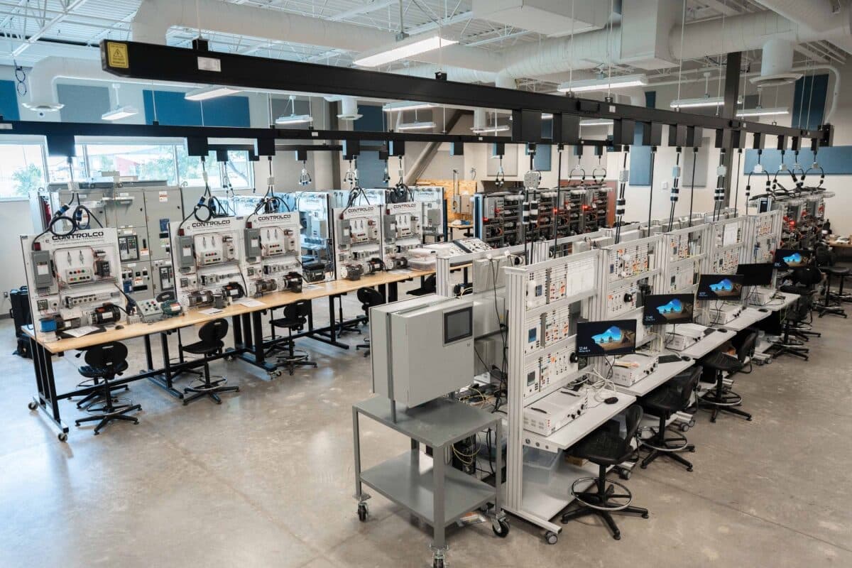 Electrical and controls training lab with rows of workstations