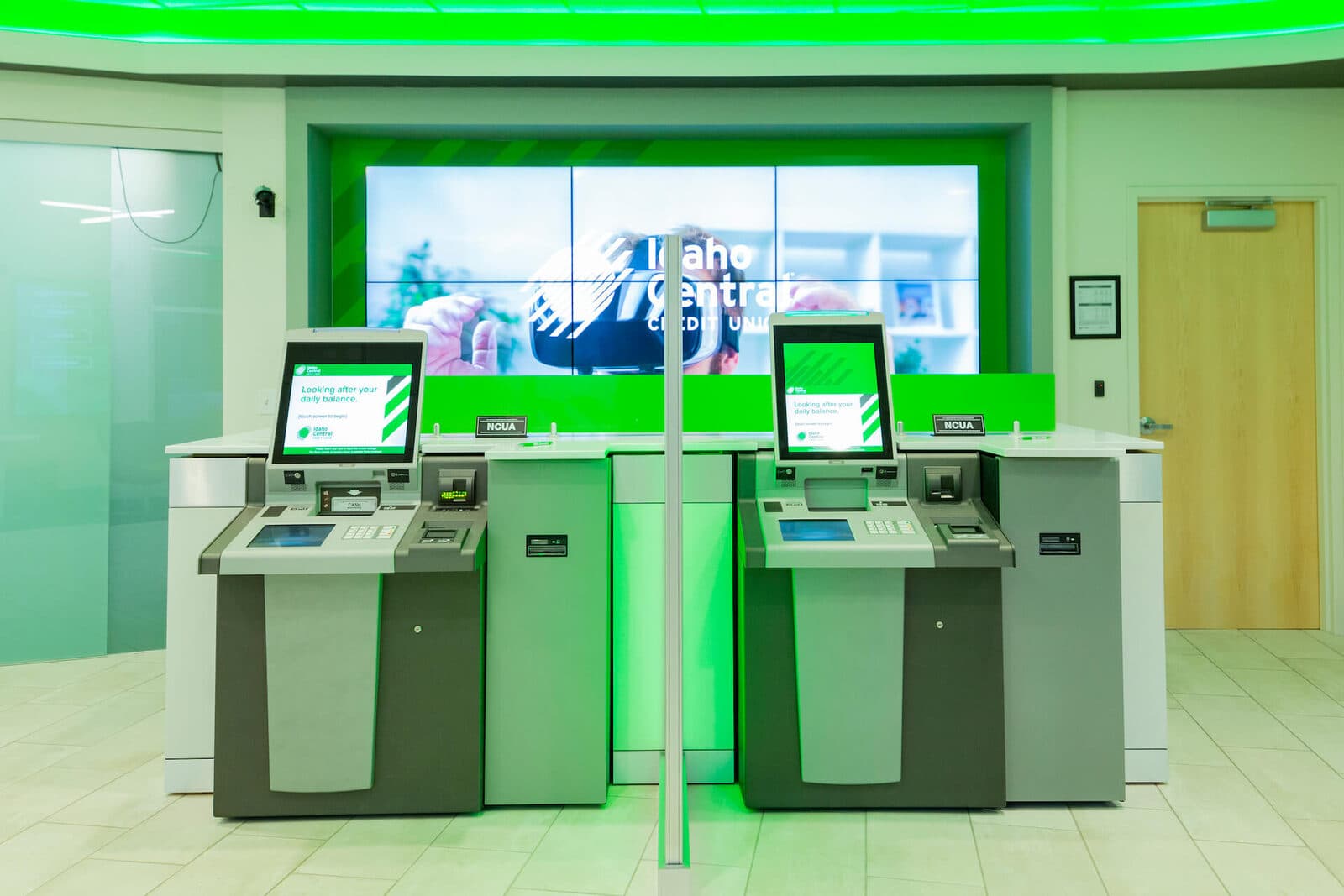 Self-service kiosks in a credit union branch lobby